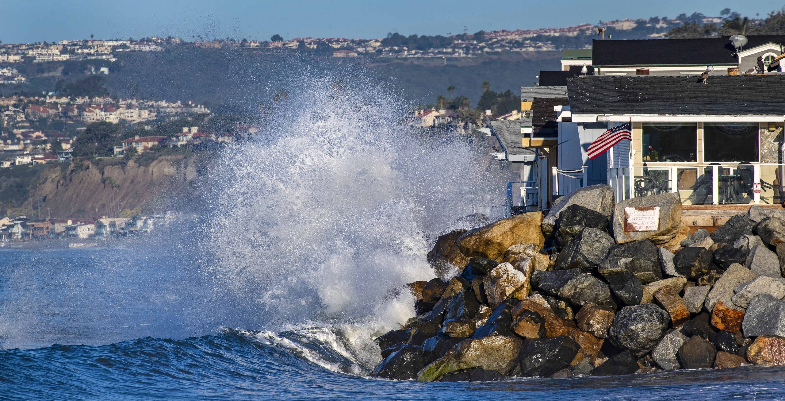King tides threaten roads and cover beaches in preview of sea level